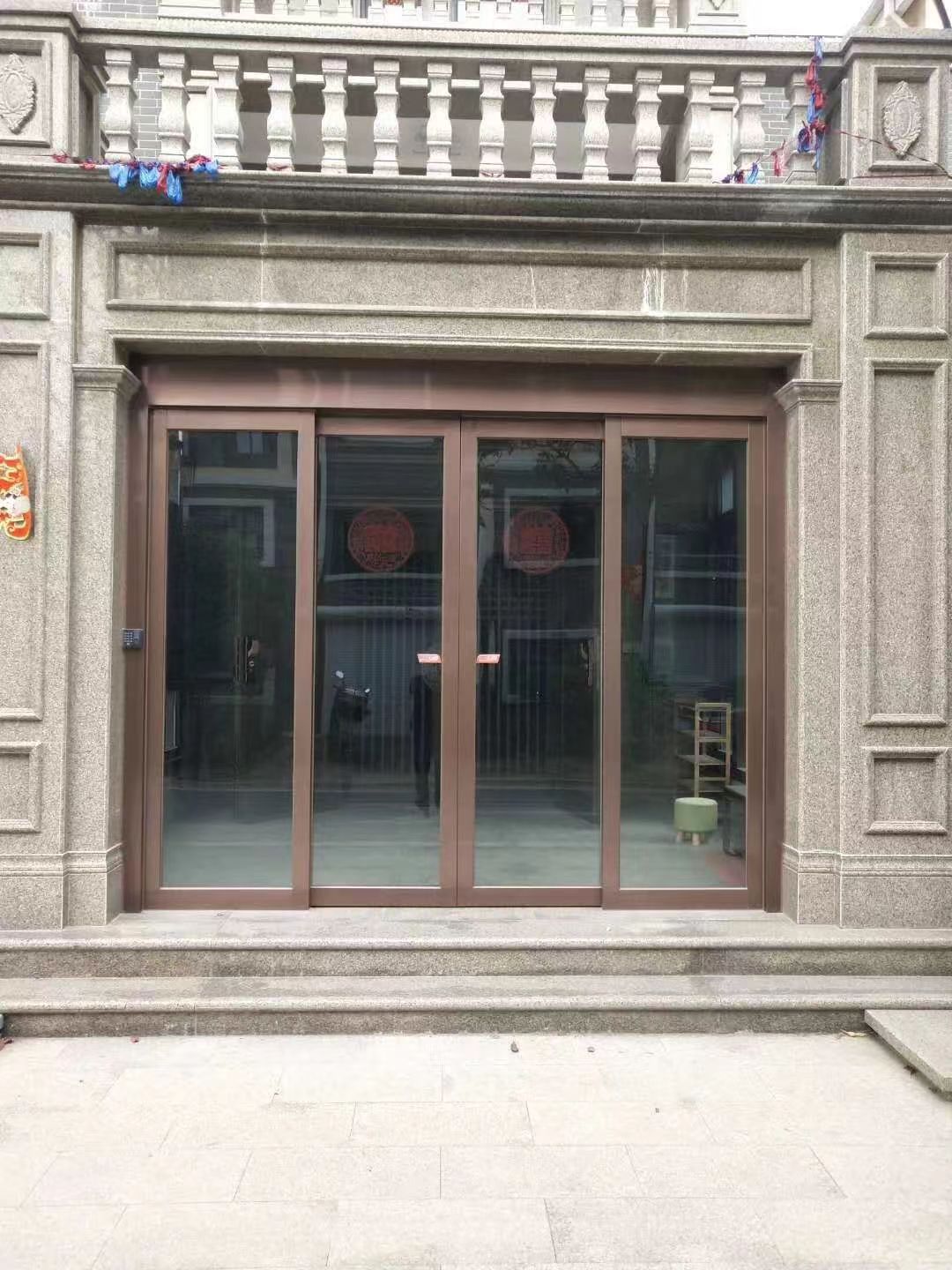 仪征市玻璃伸缩门